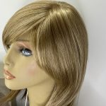 New boxed soft cap blonde wig. Bblls82