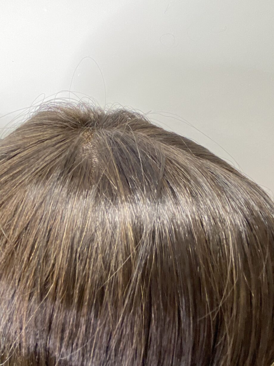 Long brown wig in box. Bbrls75