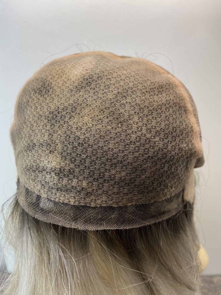 Sleek stylish silver rooted wig. Soft cap.   Gms97