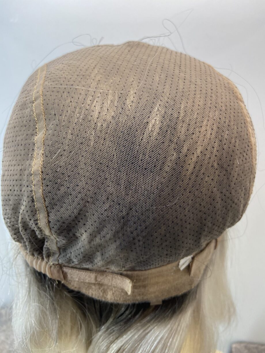 Sleek stylish silver rooted wig. Soft cap.   Gms97