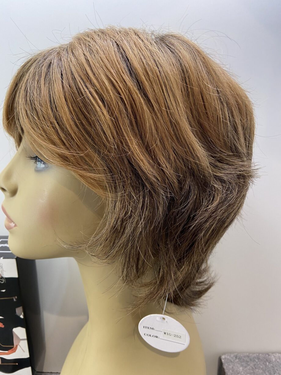 Short brown tag on wig. Bbrss203