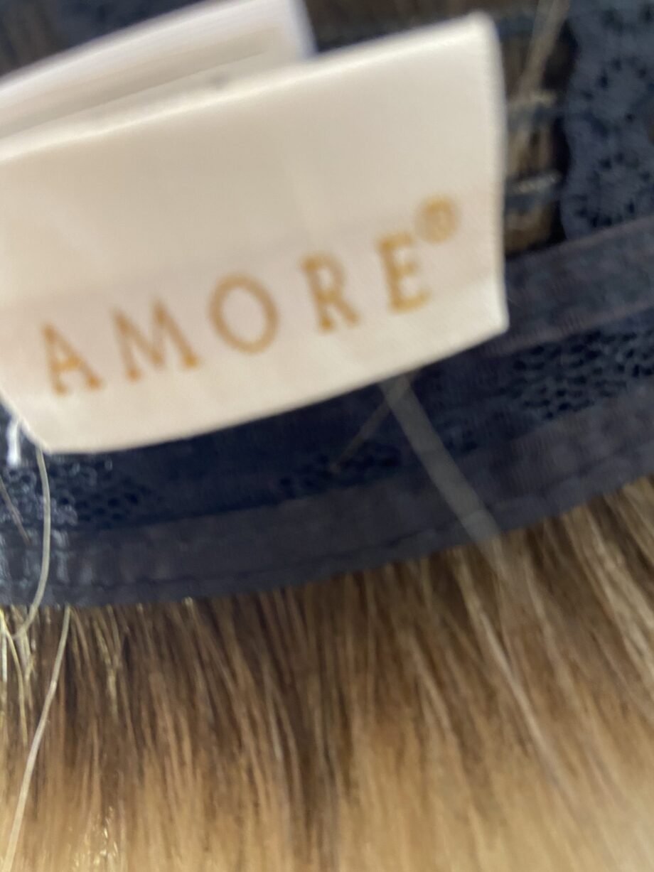 Shiny mid length new wig. Bbrms250