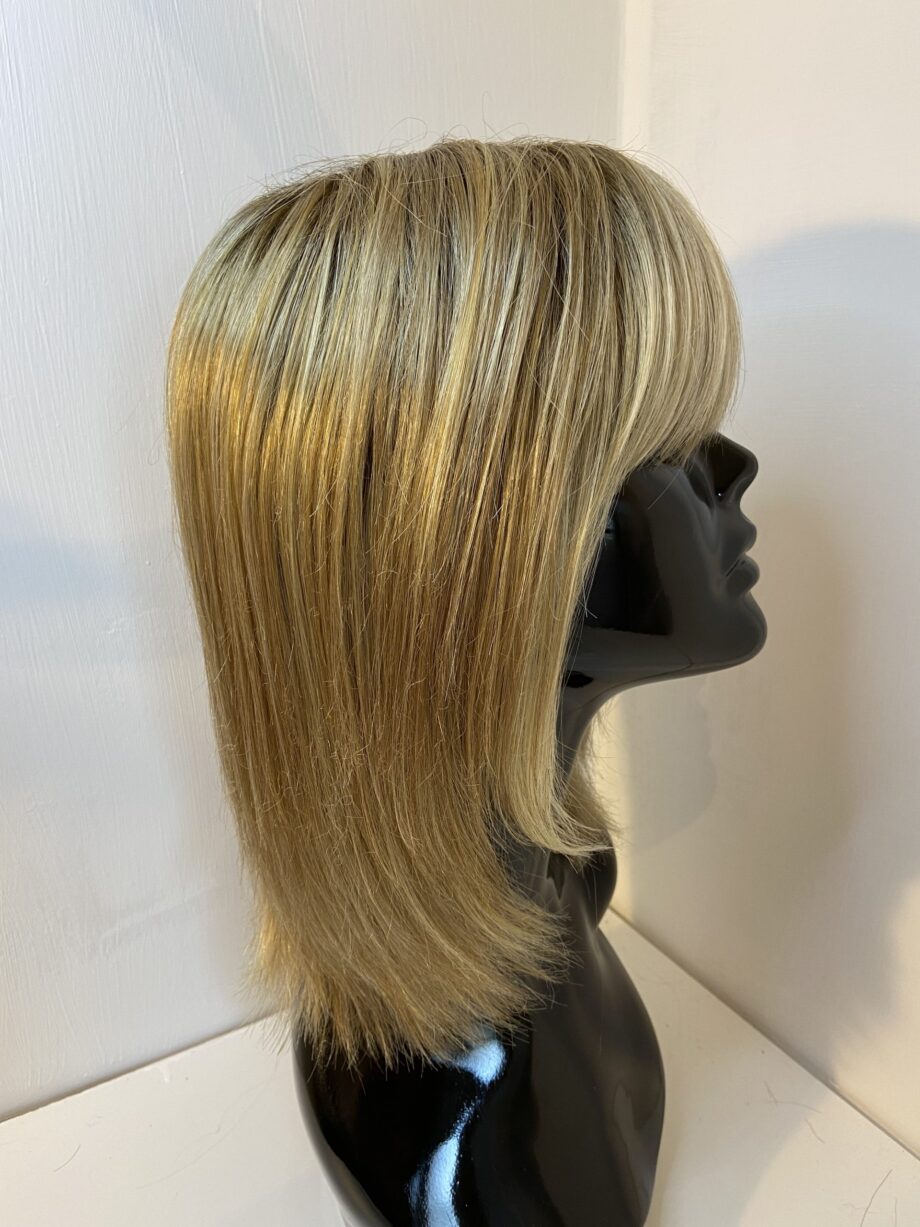 Blonde rooted mid length designer wig. Blms5168