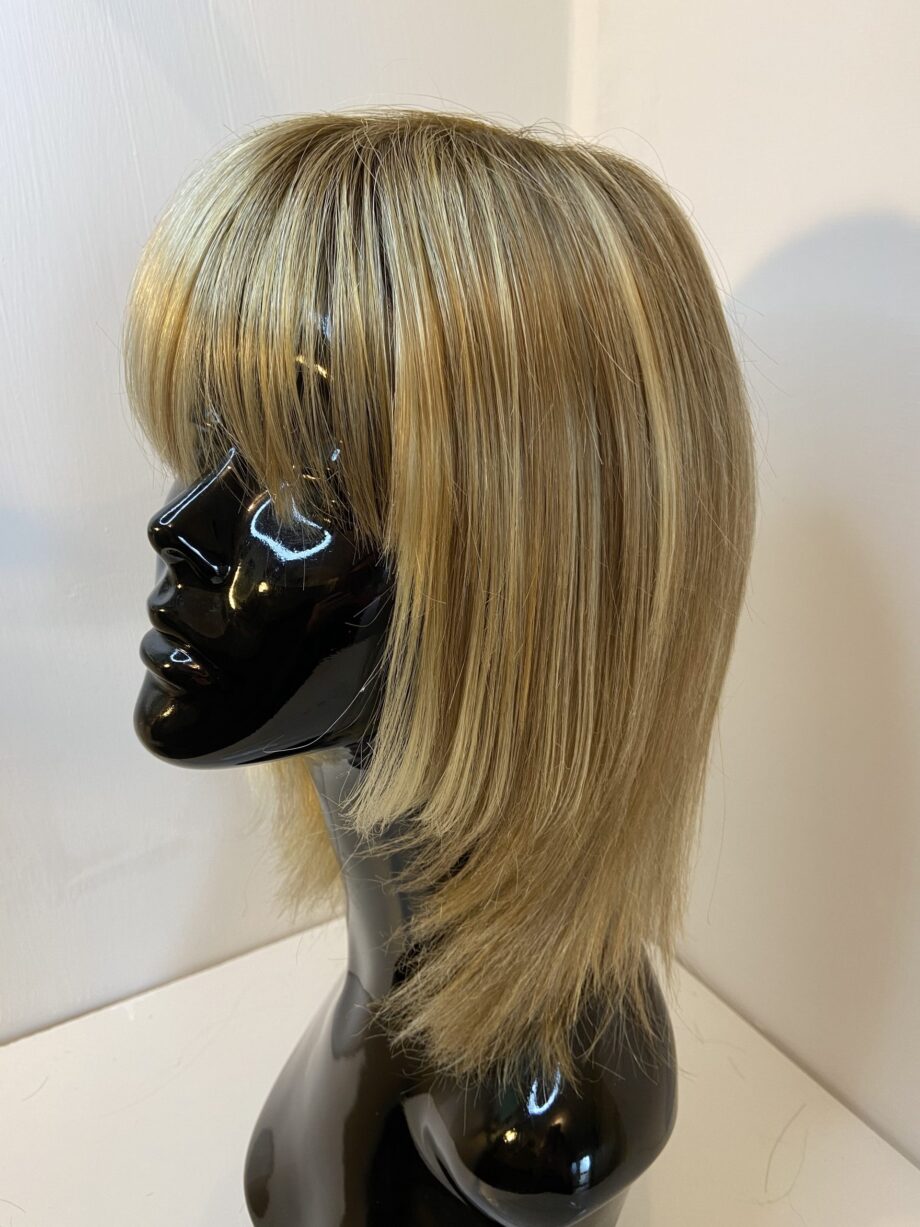 Blonde rooted mid length designer wig. Blms5168