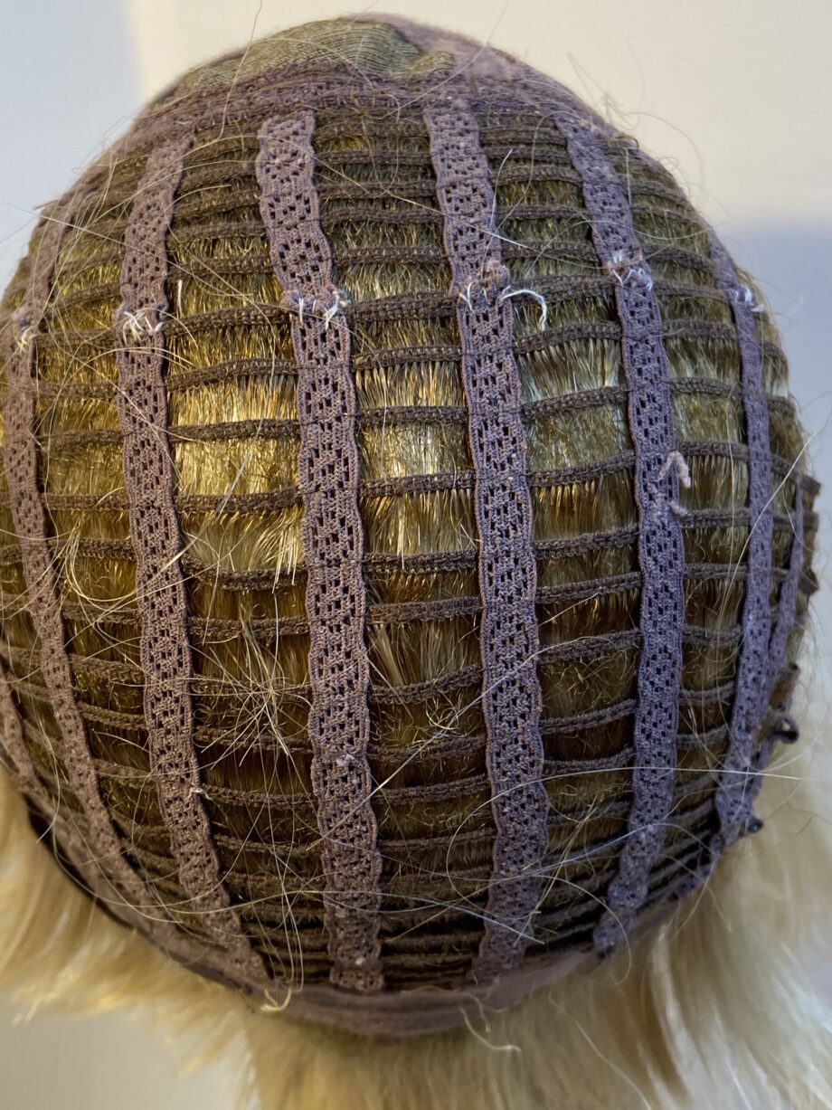 Rooted blonde mid length wig. Blms8027