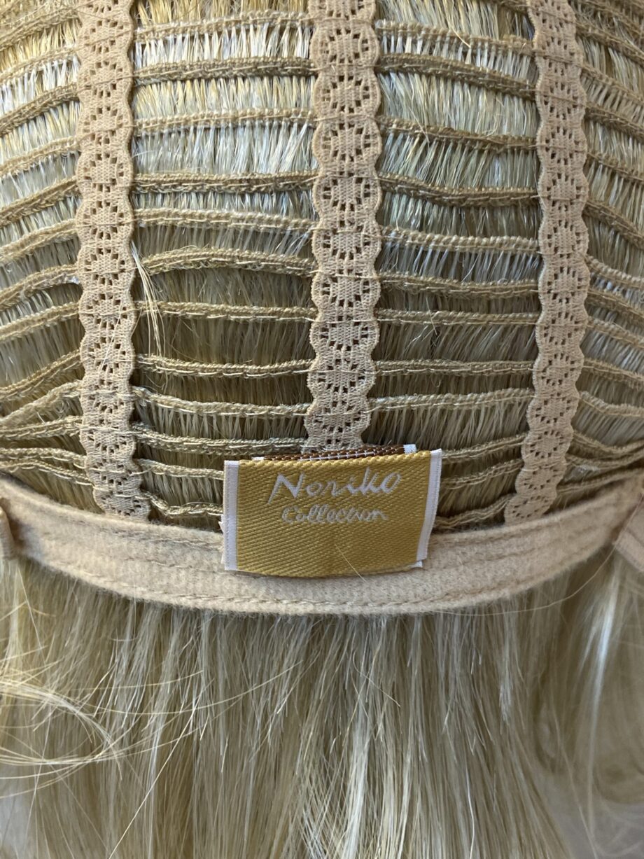 Mid length blonde Noriko wig. Blms750