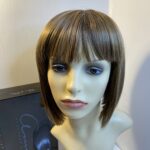 Stylish boxed Rene of Paris blonde wig. Bblms303