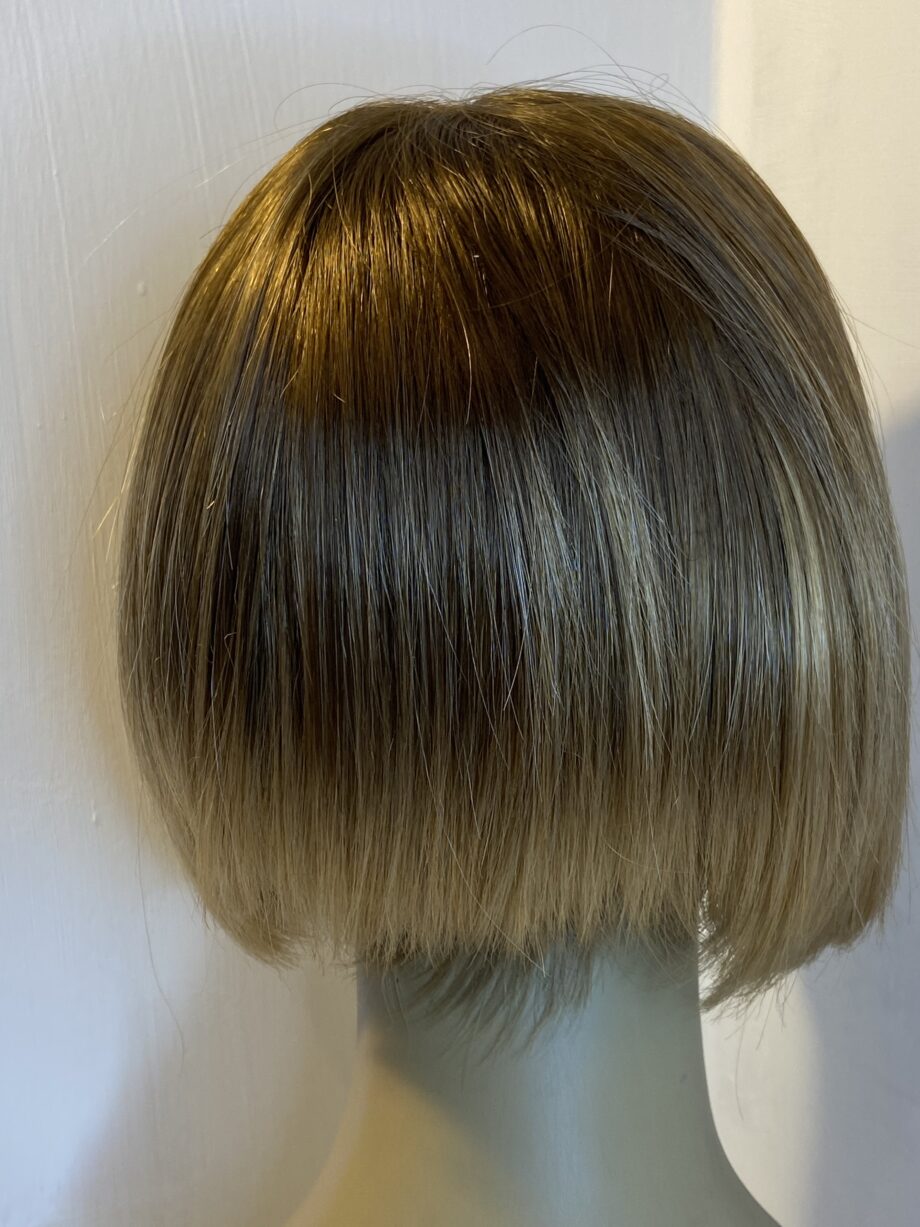 Rooted blonde/brown Rene of Paris wig. Brms477