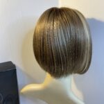Stylish boxed Rene of Paris blonde wig. Bblms303