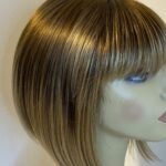 Rooted blonde Rene of Paris wig. Brms480