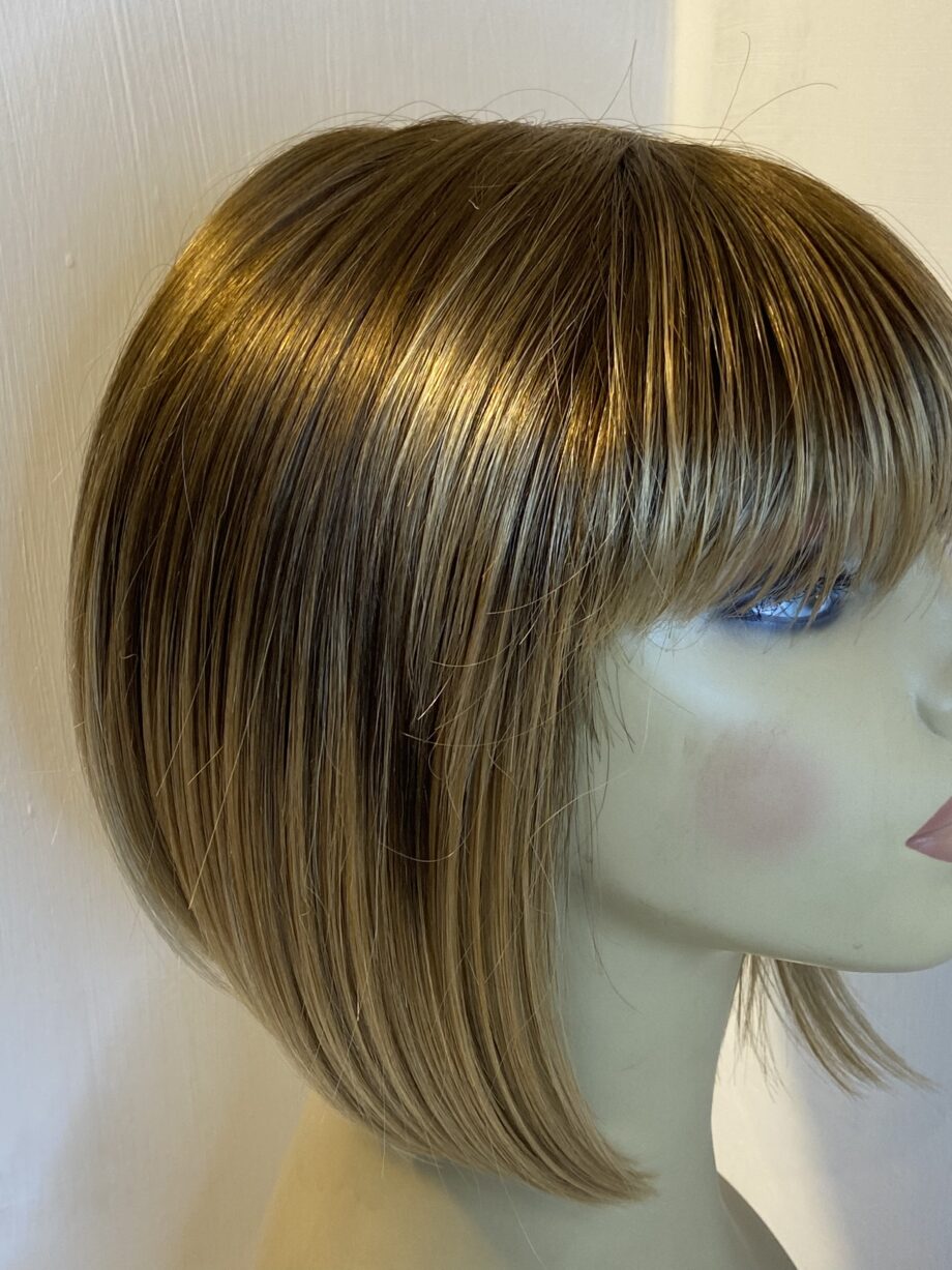 Rooted blonde Rene of Paris wig. Brms480