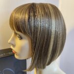 Stylish boxed Rene of Paris blonde wig. Bblms303