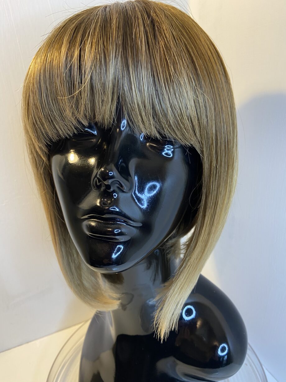 Rooted Rene of Paris collection wig. Brms481