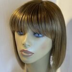 Rooted blonde Rene of Paris wig. Brms480
