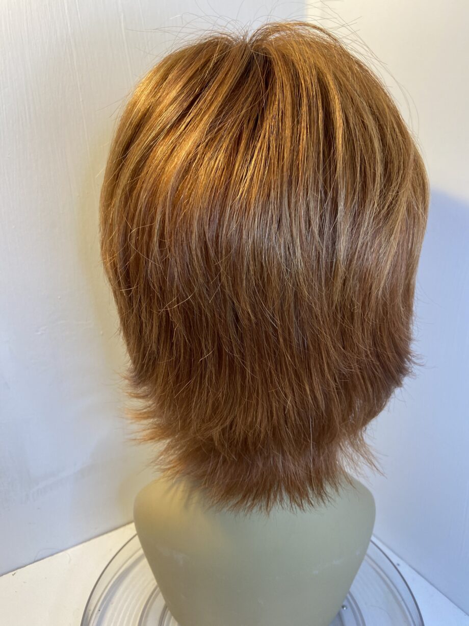 Beautiful red mid length wig. Rms525
