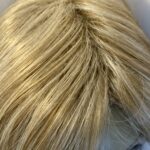Soft shiny mid length blonde.  Blms99