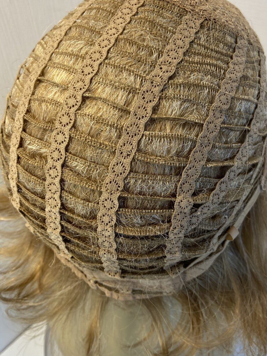 Soft shiny mid length blonde.  Blms99