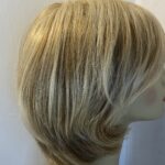 Soft shiny mid length blonde.  Blms99