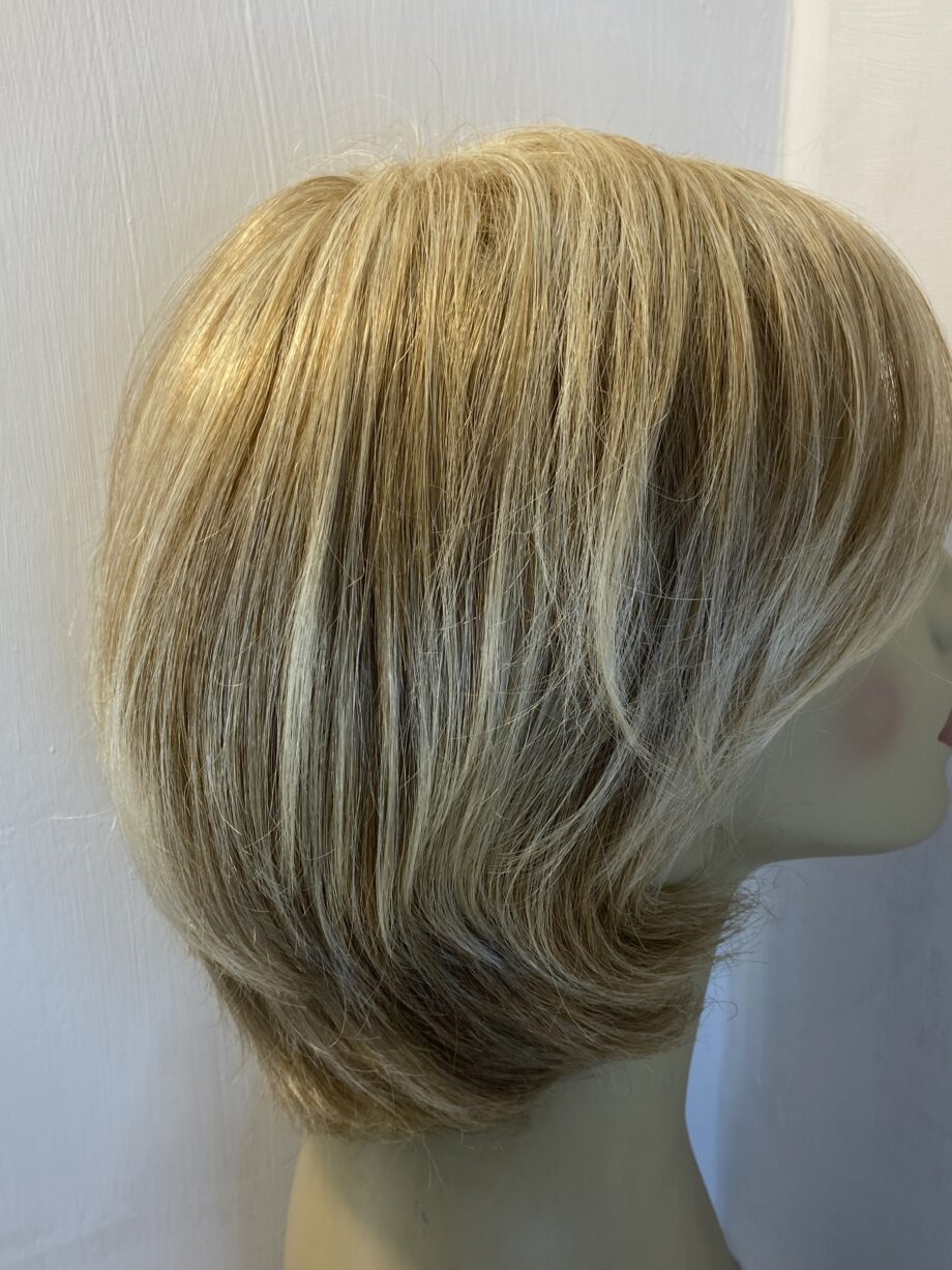 Soft shiny mid length blonde.  Blms99