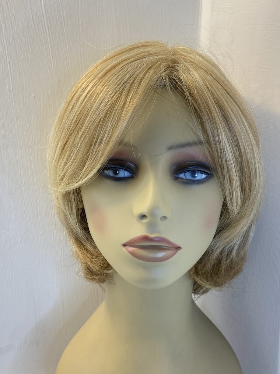 Soft shiny mid length blonde.  Blms99