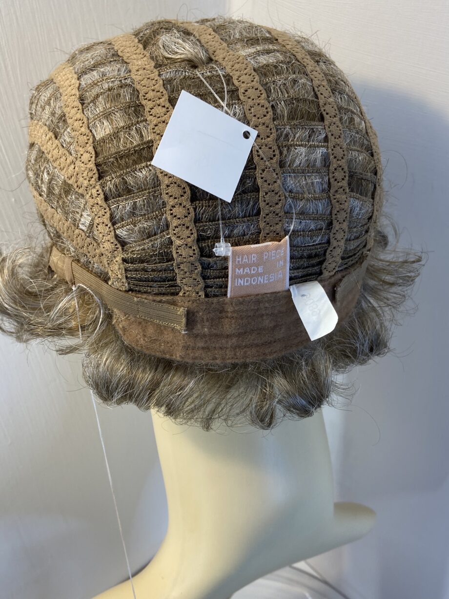 New tag on curly ash grey wig. Abmc95