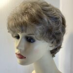 New tag on curly ash grey wig. Abmc95