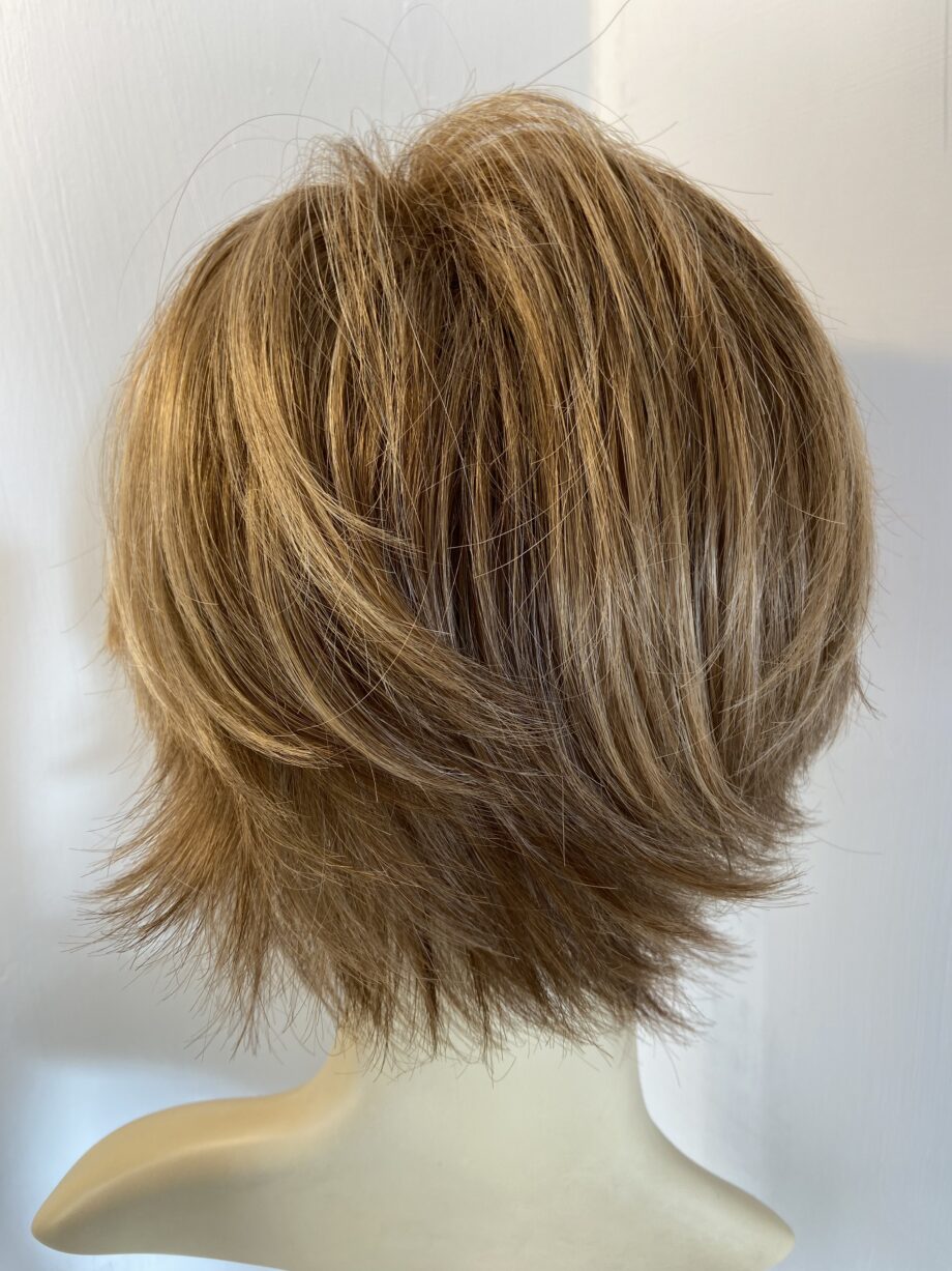 Sandy blonde mid length soft wig. Blms78