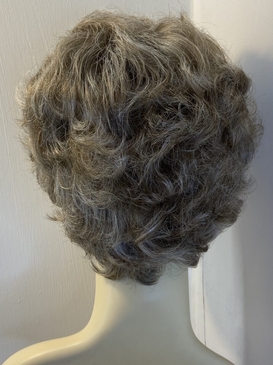 New tag on curly ash grey wig. Abmc95