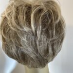 Raquel Welch blonde wig. Blms79