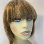 Rene of Paris honey blonde wig. Blls319