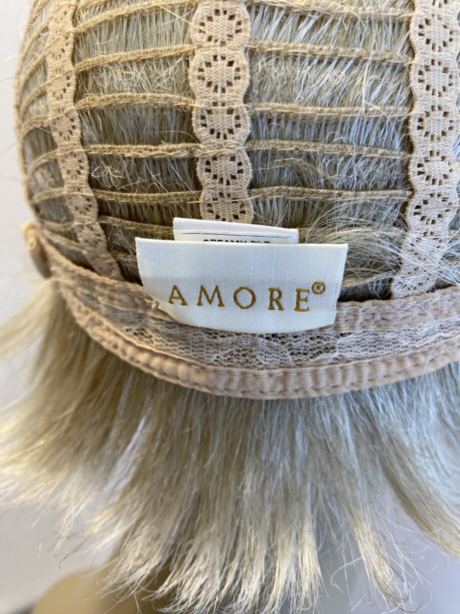 Blonde short Amore design wig. Blss634