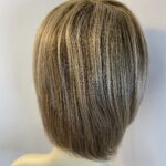 Light brown / blonde mid length wig. Blms635