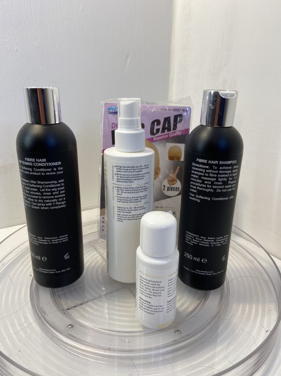 Selection of wig care hair products. 73