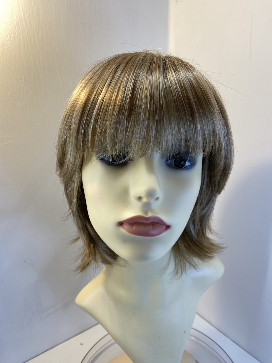 Blonde as new mid length wig. Rene of Paris. Blms430