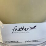 Feather premier collection wig. Brss586