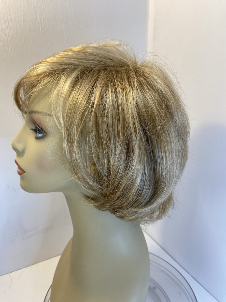 Never worn blonde Paul young wig. Blmw329