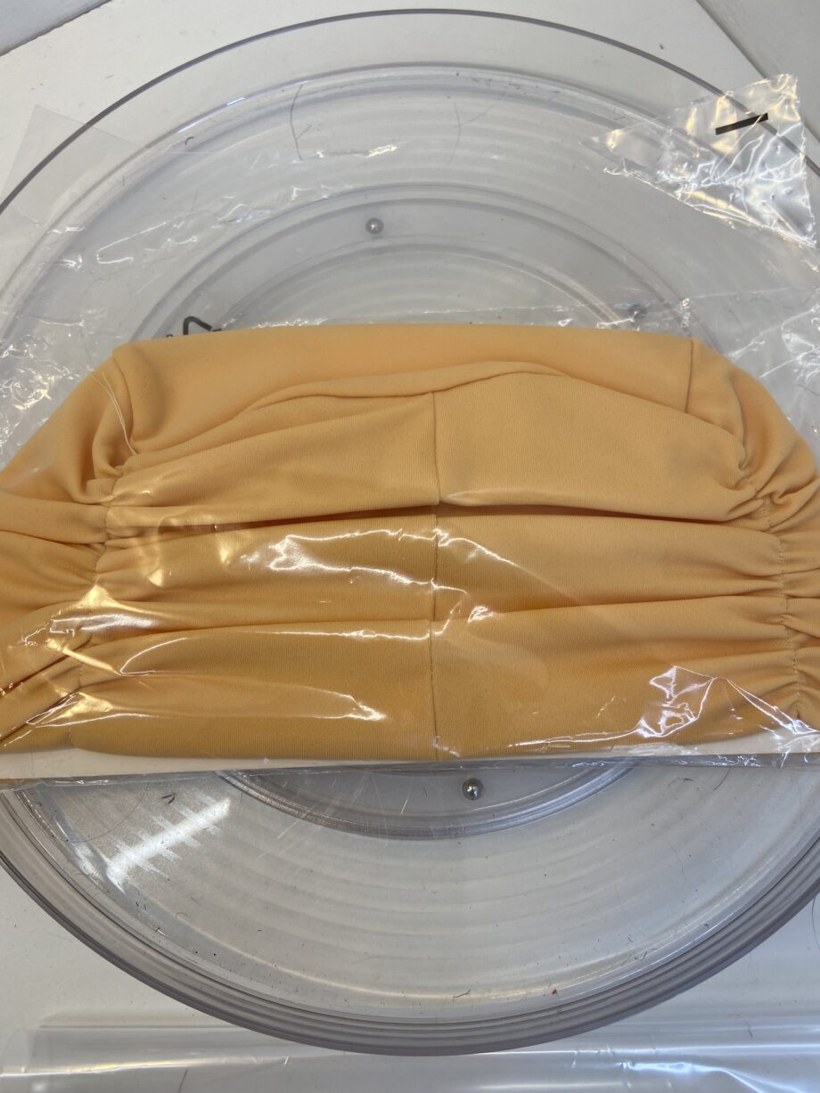 Orange turban.  80