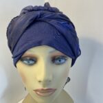 Dark blue turban with ribbons. 83