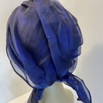 Dark blue turban with ribbons. 83