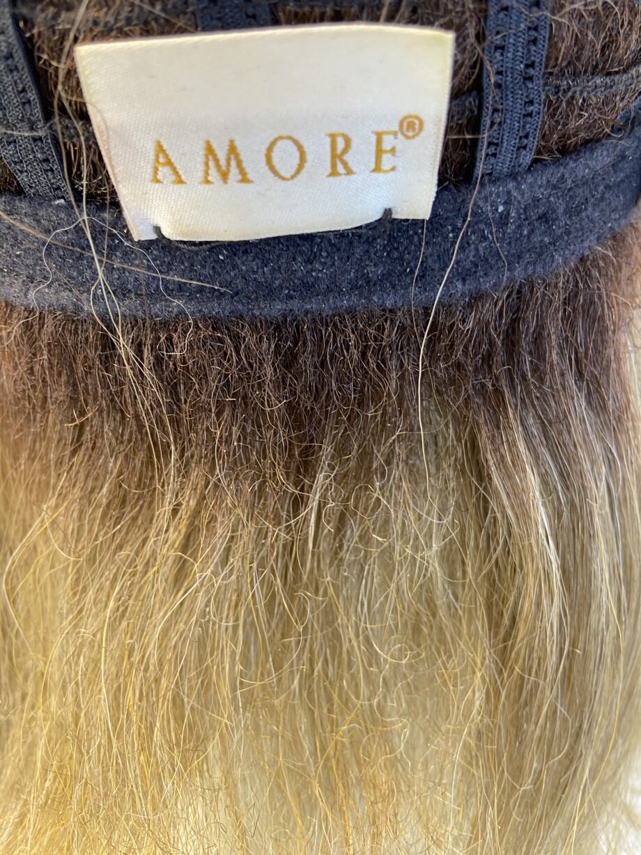 Mid length blonde wig. Blls49