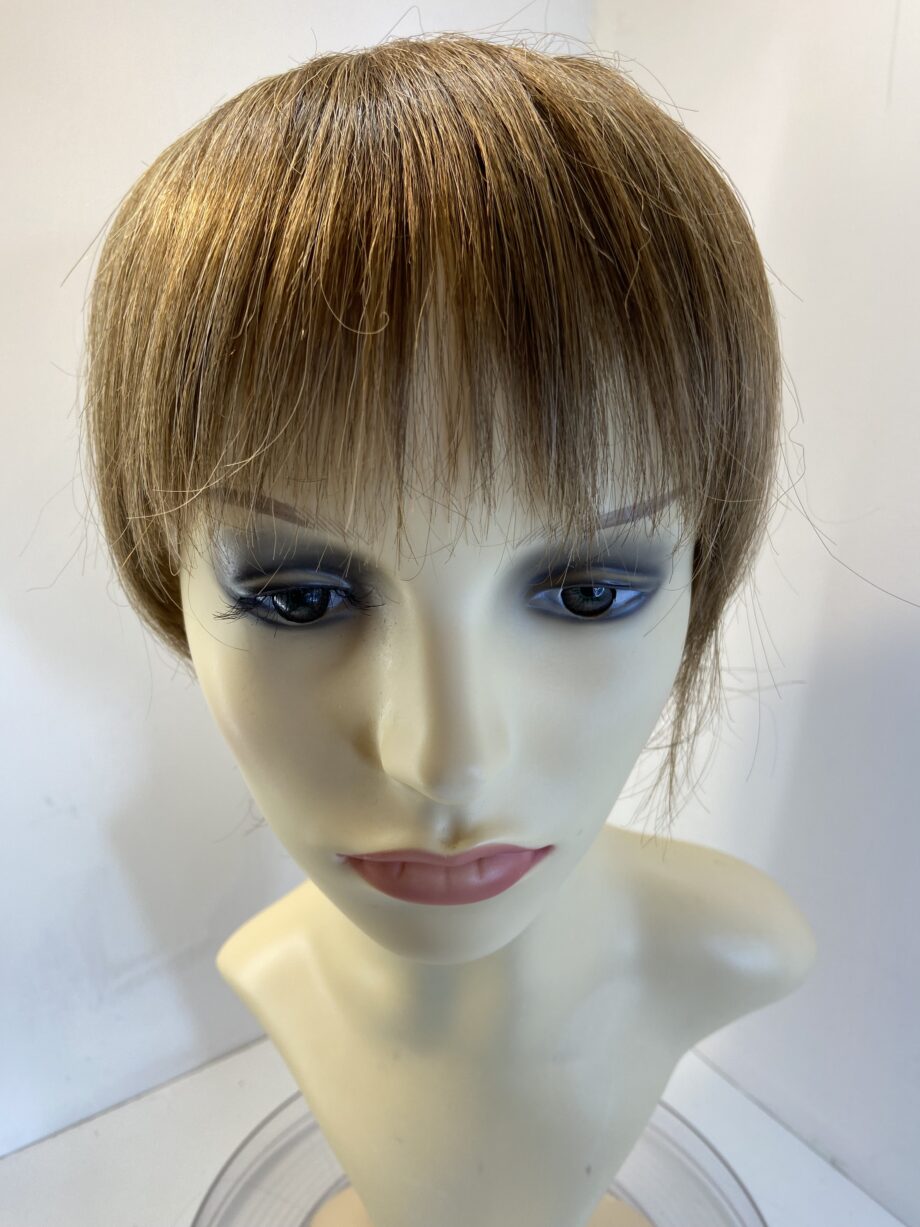 Brown hair piece. Brss729