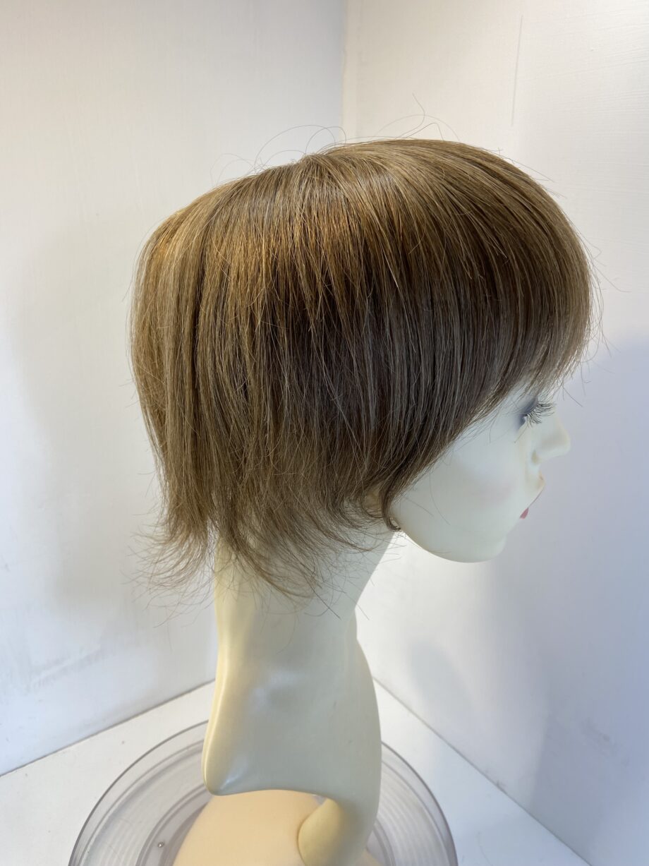 Brown hair piece. Brss729