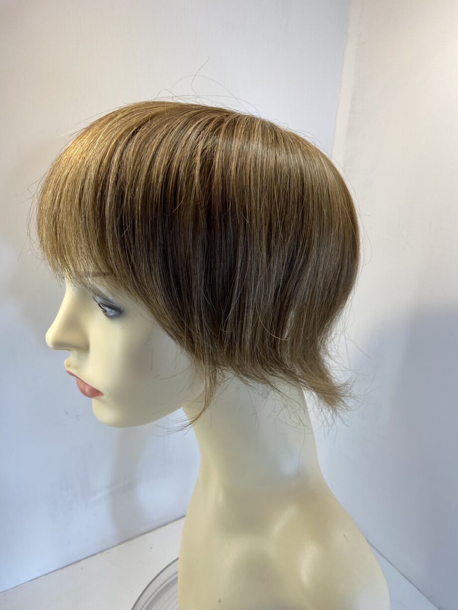 Brown hair piece. Brss729