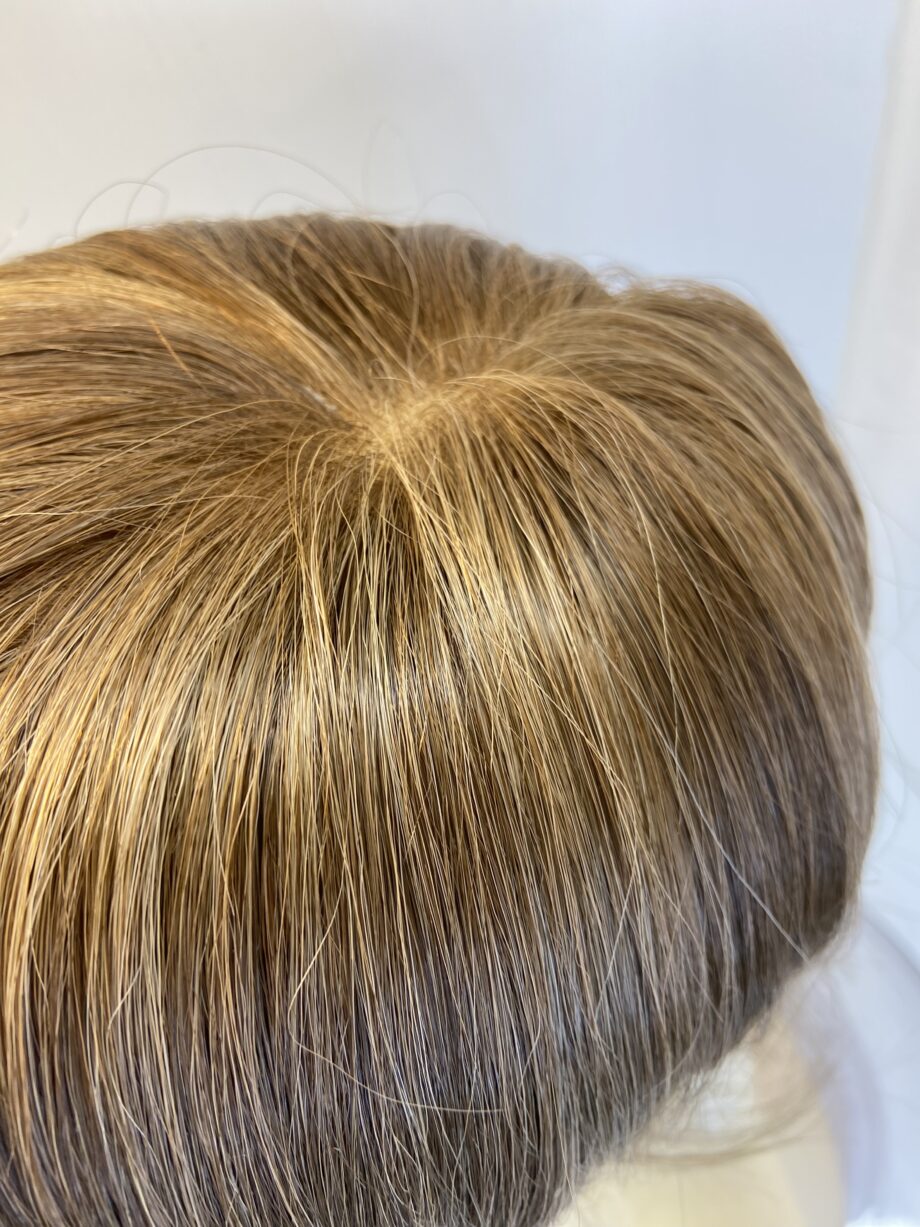 Brown hair piece. Brss729