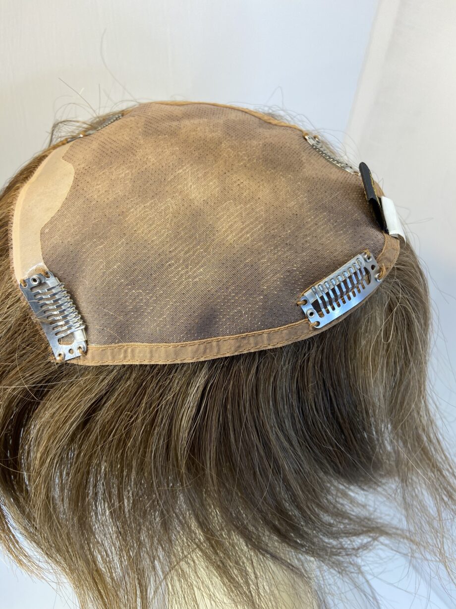 Brown hair piece. Brss729