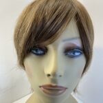 Brown hair piece. Brss730