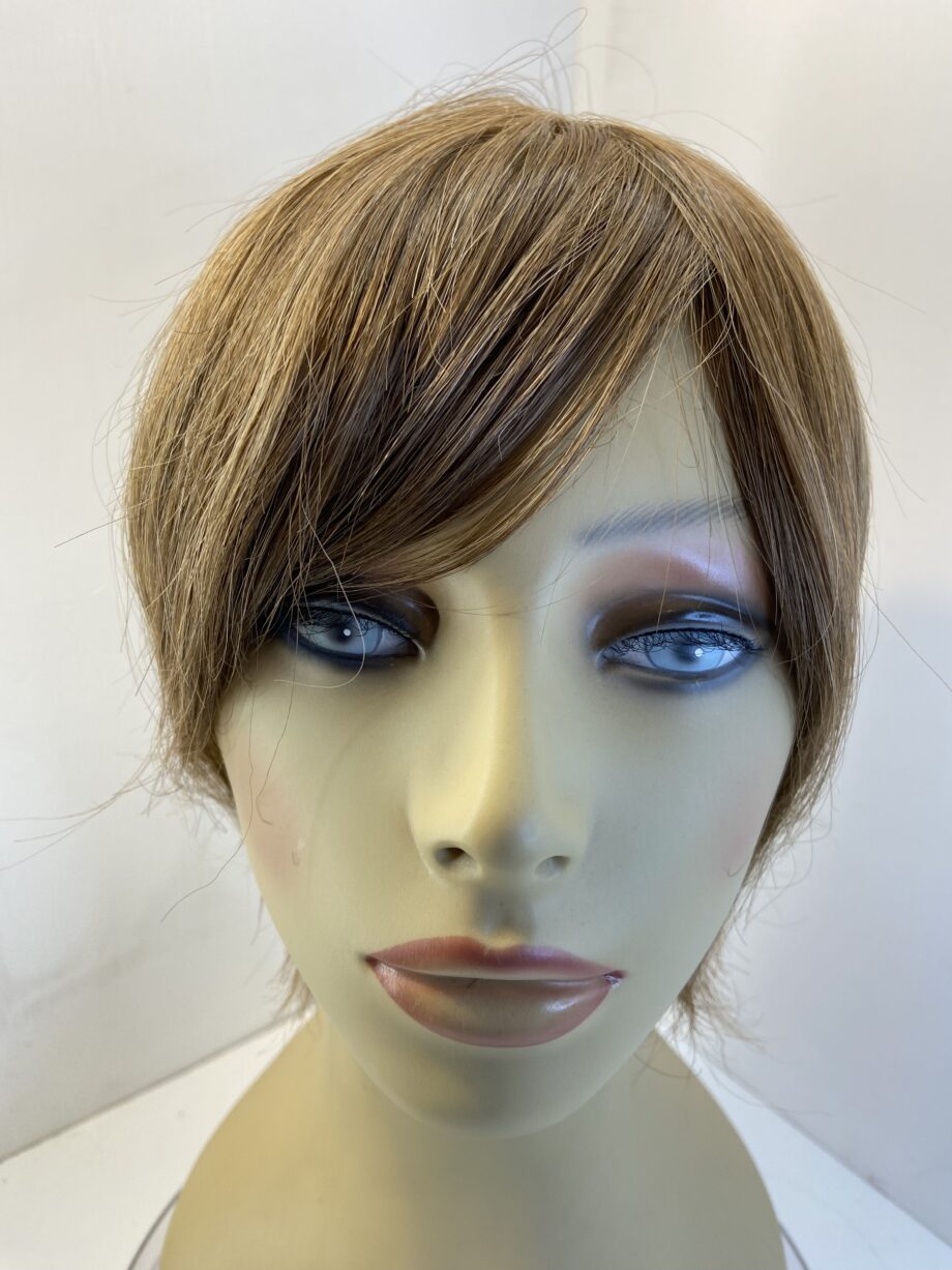 Brown hair piece. Brss730