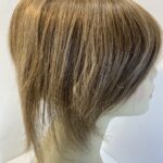 Brown hair piece. Brss730