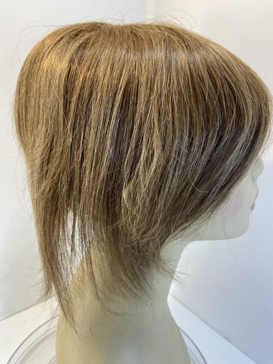 Brown hair piece. Brss730
