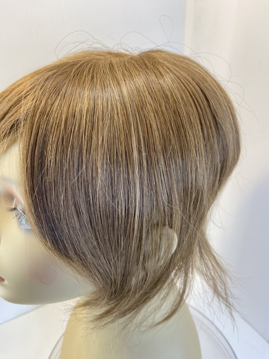 Brown hair piece. Brss730